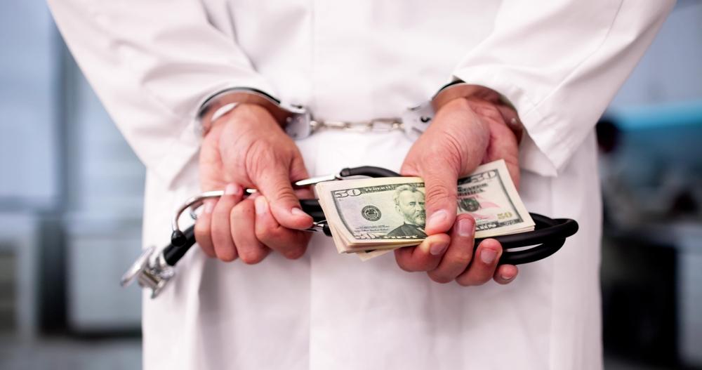 Medical Malpractice and Medicine Fraud. Healthcare Physician in Handcuffs